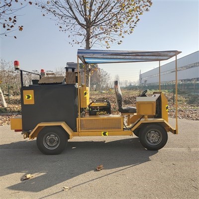 Camió de calafates d'asfalt